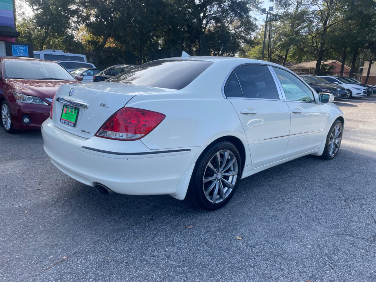 2006 WHITE ACURA RL (JH4KB16526C) with an 3.5L engine, Automatic transmission, located at 5103 Dorchester Rd., Charleston, SC, 29418-5607, (843) 767-1122, 36.245171, -115.228050 - Photo#6